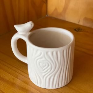 Taza de árbol con pajarito