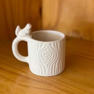 Taza de árbol con ardilla